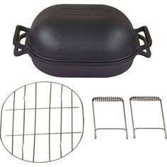 an image of a grill with tongs and grates on the side for cooking