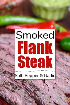 smoked flank steak with peppers and garlic on the side