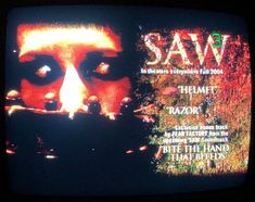 a tv screen with the words saw on it