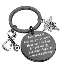 a keychain with a quote on it that says, take pride in how far you've come