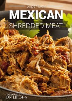 shredded meat in a bowl with cilantro on the side and text overlay