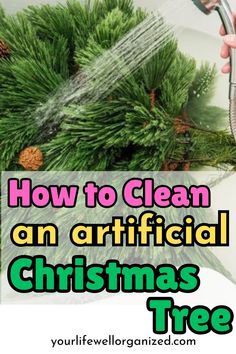 someone is watering their christmas tree with the words how to clean an artificial christmas tree