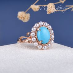 Antique Turquoise Art Deco Engagement Ring Rose Gold Oval Cut Akoya Pearl Halo Vine Unique Flower Milgrain Filigree Anniversary Gift For Her ITEM INFORMATION: Metal Type: Solid 14K Rose Gold Band Width: 1.8mm Size: US4-9 Center Stone: 7*9mm Natural Turquoise Weight: 1.78CT Side Stone: Natural Akoya Pearl*14 √ CUSTOM √ LAYAWAY √ ENGRAVING √ GIFT WRAPPING All our jewelry is 100% authentic. Please check the availability of selected gems and other detail before purchase. Feel free to contact me for Rose Gold Oval Engagement Ring, Pearl Halo, Turquoise Art, Antique Turquoise, Gold Rings Simple, Engagement Ring Rose Gold, Unique Flower, Art Deco Engagement, Ring Rose Gold