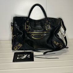 Used Balenciaga City Mini. Black With Gold Hardware. Beautiful Bag That’s Been Loved With Care But Still Has Lots Of Miles Left On Her Bags Balenciaga, Balenciaga Bag, City Bag, Balenciaga City Bag, Beautiful Bags, Vintage Accessories, Gold Hardware, Balenciaga, Bag Lady