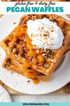 the waffles are topped with whipped cream and pecans