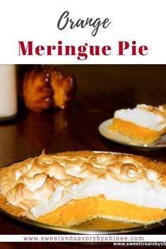 an orange meringue pie is on a plate