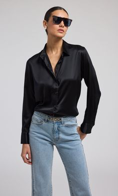 95% Silk/5% Elastane Unlined Professional Dry Clean Relaxed Fit Length: 28" Iridescent Buttons Style: W01124003 Model Size & FitModel wears a size XSModel's height: 5'10”/177cm Silk Blouse Outfit, Black Silk Blouse, Denim Trends, Blouse Outfit, Dress Pant, New Tops, Jacket Sale, Black Silk, Go Out