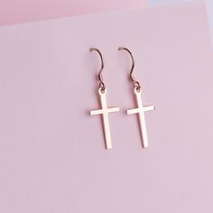 Cross earring, Dainty Cross earring, Personalized Earring, Custom Cross, Religious Earring, Earring Gift, Religious Jewelry Gift For Mother ►HOW TO ORDER - Please select your preferred color. ►PRODUCT DETAILS Cross Lenght is 22 mm. Cross Width is 12 mm. The material is Solid Sterling Silver. This beautiful earring comes with a special gift box. Please make a note if you would like to leave a gift message along with your order. ►SATISFACTION GUARANTEED!! - I gladly accept returns and exchanges. - Single Cross Earring As Gift, Minimalist Cross Earrings For Gift, Elegant Cross Earrings For Everyday, Elegant Everyday Cross Earrings, Minimalist Gold Cross Earrings, Everyday Elegant Cross Earrings, Nickel-free Cross Earrings As Gift, Nickel-free Cross Earrings For Gift, Minimalist Hypoallergenic Cross Earrings