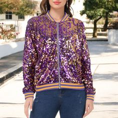 Step into the spotlight with the Anna-Kaci Women's Sequin Jacket, a dazzling blend of style and comfort. This eye-catching bomber jacket is perfect for adding a touch of glamour to any outfit.

- Material: 100% Polyester
- Size: Small
- Color: Purple and Gold
- Gender: Female
- Features: Long sleeves, front zip closure, and practical pockets

Crafted from soft polyester, this jacket offers a lightweight feel with a fully lined interior for comfort. The vibrant purple and gold sequins ensure you Sequins Blouse, Female Features, Female Design, Sequin Blazer, Style Blazer, Sequin Design, Jacket With Pockets, Open Front Jacket, Sequin Jacket