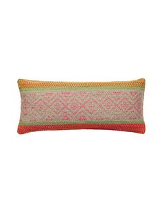 an orange and pink pillow on a white background