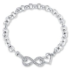 A gleaming sterling silver heart embraces an infinity symbol outlined with glimmering diamonds in this sweet bracelet for her. Totaling 1/10 carat in diamonds, the 7.5-inch chain is secured with a tongue clasp. Gold Layered Bracelets, Pearl Diamond Jewelry, Cross Jewelry Necklace, Fan Jewelry, Bracelet For Her, Jewelry Advice, Diamond Wedding Rings Sets, Infinity Heart, White Bracelets