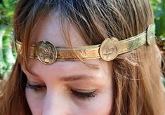 A beautiful new design.  Fabulous presence.  Beautiful Water Bird stamping. Circlet crown has slider closure for easy and  adjustable sizing. Medieval Crowns, Norse Crown, Viking Crown, Adjustable Fantasy Headband With Round Crown, Circlet Crown, Medieval Headpiece, Gold Fantasy Crown Costume Headpiece, Fantasy Crown-shaped Headband For Costume, Golden Circlet Crown