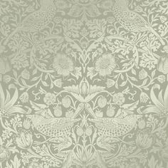 an old wallpaper pattern with birds and flowers on the side, in light green