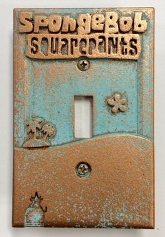 an old metal switch plate cover with the words stonebud squattones on it