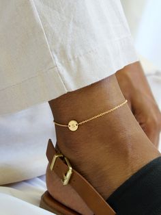 Dainty and minimal, our Lola anklet features a tiny disk, personalized with your initial or the initial of a loved one. This meaningful piece is made of high quality 14k gold fill or sterling silver so you can enjoy wearing it all summer and every season after. A cute gift for your bridesmaids, best friends, and anyone who likes leisurely looks and vacation vibes!  This listing is for one [1] anklet. | MATERIAL * 14k Gold Filled * Sterling Silver *Please note: We do our best to properly and accu Anklet With Initials, Minimalist Adjustable Hypoallergenic Anklet, Adjustable Hypoallergenic Minimalist Anklet, Personalized Adjustable Dainty Anklets, Personalized Dainty Adjustable Anklets, Personalized Adjustable Elegant Anklet, Elegant Personalized Adjustable Anklet, Dainty Personalized Adjustable Anklets, Minimalist Rose Gold Anklet As Gift