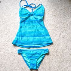 Hobie Brand Swimsuit, 2 Piece Halter Tankini With Bikini Bottoms, Crochet Blue Ocean Colors, Both Are Small Excellent Condition, Never Worn, Smoke-Free Home, Free From Rips, Tears, And Stains Turquoise Tankini For Swimming Beachwear, Turquoise Beachwear Tankini For Swimming, Turquoise Stretch Tankini For Vacation, Turquoise Sleeveless Tankini For Swimming, Sleeveless Turquoise Tankini For Pool, Stretch Blue Swim Dress For Pool, Blue Stretch Swim Dress For Beach, Blue Stretch Swim Dress For The Beach, Turquoise Tankini For Summer Swimming