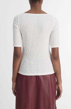 Puckery texture defines a trim-fitting knit top fashioned with a V-neck and elongated short sleeves. 22 1/2" length V-neck Short sleeves 72% polyester, 23% cotton, 5% spandex Hand wash, dry flat Imported Knit Top, Top Styles, Top Brands, Hand Wash, Short Sleeves, Nordstrom, Off White, Spandex, Trim