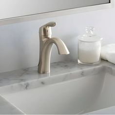 Upgrade your bathroom experience with this lavatory faucet manufactured by Moen. This bathroom faucet comes with a lever handle that moves in a pivot direction for smooth adjustment of water. It comes with a pop-up metal waste assembly and an optional three-hole deck plate. Its flow rate can range from 1.2 to 1.5 gallons per minute which is perfect for day-to-day bathroom tasks, be it washing hands or brushing teeth. This one lever handle faucet comes with a brushed nickel finish which gives your bathroom a mild and pleasant look. It is designed to be installed for 1-hole or 3-hole applications. This single-handle lavatory faucet is compliant with the specifications of the American with Disabilities Act, ensuring safety for its users even the elderly and disabled. It can also be purchased Moen Eva Brushed Nickel, Brushed Nickel Bathroom Faucet, Nickel Bathroom Faucet, Bathroom Faucets Brushed Nickel, Nickel Bathroom, Brushed Nickel Faucet, Brushed Nickel Bathroom, Washing Hands, Lavatory Faucet