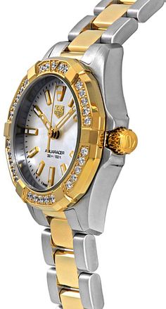 Model # WBD1421.BB0321 TAG HEUER AQUARACER WOMEN'S QUARTZ LUXURY WATCH - With Manufacturer Serial Numbers - Swiss Made - Mother of Pearl White Dial with Yellow Gold Accents - Brushed with Polished 18k Yellow Gold Bezel Set with Diamonds - 30 VS Diamonds Set on Bezel (0.40ct) - Polished 18k Yellow Gold Crown - Index Hour Markers - Date Feature - Battery Operated Quartz Movement - 3 Year Warranty - Guaranteed Authentic - Certificate of Authenticity - Manufacturer Box & E-Manual (will be sent by email) - Brushed with Polished Stainless Steel Case - Brushed with Polished 18k Yellow Gold with Stainless Steel Bracelet - Scratch Resistant Sapphire Crystal - 300 Meters / 1000 Feet Water-Resistant - 27mm = 1" Case, 6" Adjustable Bracelet - Unidirectional Rotating Bezel - Luminescent Hands & Hour Ma Tag Heuer Aquaracer, Vs Diamond, Gold Crown, Polished Stainless Steel, Tag Heuer, Women's Watch, Ladies Watch, White Dial, Swiss Made