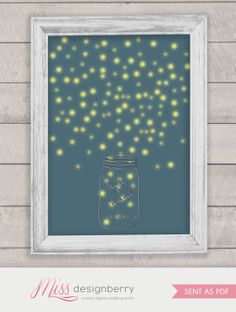 a mason jar with fireflies in it on a wooden wall next to a white frame