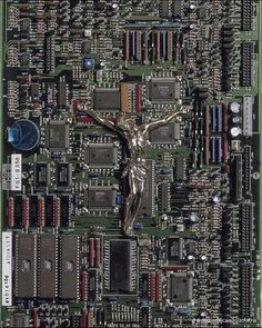 a computer motherboard with a crucifix on it