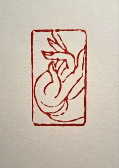 a drawing of a hand holding a bird in a square with red ink on white paper