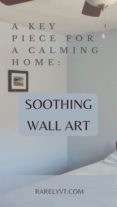 a bedroom with a bed, ceiling fan and pictures on the wall above it that says soothing wall art