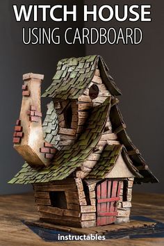 a wooden house with the words witch house using cardboard