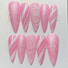 Pink winter nails with a translucent chrome candy cane design, sparkly matte snowflakes, and snow effect nail.  These can be customized to your choice of color and the writing on the nail, as long as it fits :) just let me know in the personalization box.  What comes in your package?? - your 10 piece nail set  - mini nail file  - mini buffer  - nail glue  - cuticle pusher  - adhesive tabs  - cuticle oil  - stickers  Keep in mind everything but the nails are free and will be given if available. There have been times where I run out and not able to order more before I ship out your order.  Please understand that the design will not be an exact copy since it is handmade. If you want a custom size just enter it in the personalization box :).  Disclaimer: Once the item is shipped, I am not resp Snow Writing Nails, Pink Sparkly Christmas Nails, Pink Snow Nails, Pink Short Christmas Nails, Pink Chrome Christmas Nails, Pink Christmas Nail Art, Candy Cane Nails Pink, Pink Peppermint Nails, Pink Glitter Christmas Nails