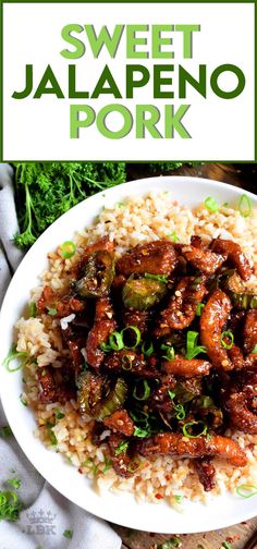 sweet and sour jalapeno pork is served over rice on a white plate