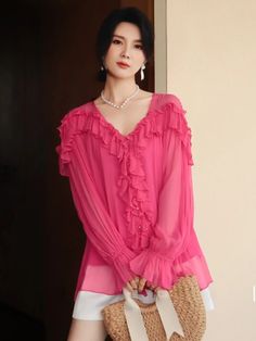 This is perfect for those who are looking for a clothing for a good price. It is fashionable, stylish, and it will look great on anyone who wears it. Do you wanahavit? SIZE S:bust:106cm,sleeve length:62cm,length:68cm M:bust:110cm,sleeve length:63cm,length:69cm Note: 1 inch = 2.54 cm, 1 cm = 0.39 inch Measurement by hands allow 2-3cm errors which is normal Pink V-neck Chiffon Top, Casual Pink Chiffon Top, Pink Chiffon Top For Workwear, Casual Pink Chiffon Blouse, Trendy Pink Chiffon Tops, Trendy Chiffon Blouse With Ruffles, Trendy Pink Blouse With Ruffles, Pink Chiffon Top For Party, Pink Chiffon Party Top