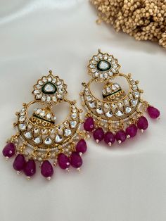 kundan  work classic chandbali statement earrings, available in 4 colors.  Lightweight  Dimensions- Earrings length- 3 inches  Style tip- Pair it with any beautiful traditional outfits  and flaunt with Unique style of collection from us. Perfect match for Festival and Traditional wear.  Take Care Tips-  Kee away from perfume, Hair spray and. Moisture.  Store in dry place , Ziplock bag or Airtight box.    Clean with dry cloth.  Jewellery is the last thing you should wear and first thing you shoul Festival Chandbali Dori Work Jhumkas, Chandbali Jhumkas With Dori Work For Festivals, Diwali Chandbali Jhumkas With Dori Work, Gold Chandbali Jhumkas With Dori Work, Festive Chandbali Jhumkas With Dori Work, Chandbali Jhumkas With Dori Work For Wedding, Wedding Chandbali Jhumkas With Dori Work, Kundan Chandbali Necklace With Dori Work, Bollywood Kundan Jhumkas With Dori Work