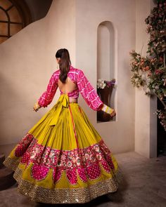 A fun silhouette with the gorgeous bishop sleeve and collar detailing along with this beautiful pink and yellow colour is here to make you stand out💗💛 @rups_boutique #NavratriOutfit #ChaniyaCholiLove #NavratriVibes #GarbaOutfitInspo #ChaniyaCholiStyle #FestiveFashion #NavratriCelebrate #ChaniyaCholiGoals #નવરાત્રીઆઉટફિટ Yellow And Pink Lehenga For Haldi, Same Colour Outfit, Leriya Chaniya Choli, Yellow And Pink Lehenga, Pink Yellow Outfit, Keep Smile, Choli Blouse Design, Garba Outfit, Navratri Lehenga