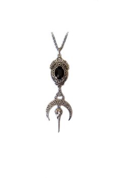 This is a new handmade necklace. It is made with antiqued silver plated settings, a ravel skull and filigree crescent moon, featuring a high quality JET BLACK glass jewel/rhinestone that sparkles like crystal. Pendant measures 4 5/8" tall and 1 1/2" wide and is worn on a sturdy rolo chain in your choice of length.This is also available in a variety of stone colors in our store, along with matching earrings. Gothic Skull Shaped Metal Jewelry, Gothic Metal Skull Jewelry, Gothic Skull Metal Jewelry, Steampunk Silver Engraved Jewelry, Steampunk Skull Jewelry For Halloween, Halloween Metal Jewelry With Oxidized Finish, Steampunk Metal Jewelry Engraved, Halloween Oxidized Metal Jewelry, Black Engraved Jewelry For Halloween