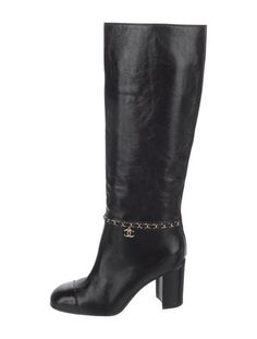 Chanel Leather Knee-High BootsFrom the 2019 Collection by Karl LagerfeldBlackInterlocking CC Logo & Chain-Link AccentRound-Toes with Chain-Link AccentsWrap-Around StrapsIncludes Dust BagFit: This style typically runs a full size small.Unfortunately, due to restrictions, this item may not be eligible for shipping in all areas. Long Chanel Boots, Chanel 2019, Cc Logo, Boot Shoes Women, Chain Link, Knee High, Shoe Boots, Chanel, Size Small