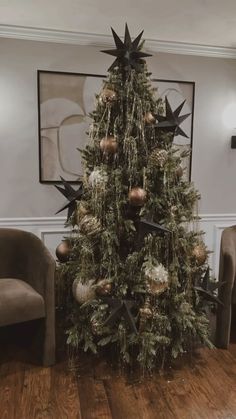 a decorated christmas tree in a living room