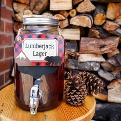 a jar with lumber label on it sitting on top of a table next to logs