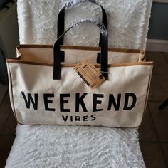 Santa Barbara,Cream ,Black Leather Handles Weekend Vibes Canvas Tote Bag Measures, 19" Long 11" Height ,It Has A Small Stain. Trendy Large Capacity Shoulder Bag For Weekends, Trendy Weekend Tote Bag, Trendy Tote Bags For Weekend, Trendy White Bag For Weekend, Trendy White Shoulder Bag For Weekend, Chic Weekend Tote Bag, Casual Canvas Bag With Leather Handles For Weekend, Chic Tote Bag For Weekend, White Canvas Bag For Weekend