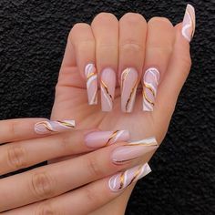 Are you obsessed with the fall season? Check out the prettiest fall nail designs and ideas to recreate this year! Acrylic Nails For Wedding Guest, Nail Designs Nude Color, Acrylic Nail Designs Gold, Nude Coffin Nail Ideas, Pretty Nude Nail Designs, Nude Acrylic Nails With Design, Pink And Nude Nails, Pink Coffin Nail Ideas, Classy Nude Nail Designs