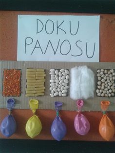 there is a sign that says doku panosu with different foods on it