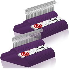 two purple combs sitting next to each other