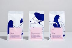 three bags with designs on them sitting next to each other in front of a white background