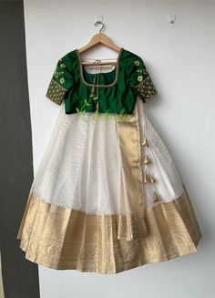 Fashion continues to change and make your own style statement. Please do send us messages regarding your dream wedding outfit. Green silk blouse with floral motif and Kali work go with an organza Lehenga which have a gold Jerry boarder. A matching dupatta and a waist belt comes with this.  It's inside is completely finished with soft cotton fabric. Size and color of blouse can be customise according to your needs. We need 10 days production time and 7 days shipping time. Green Silk Blouse, Gold Organza, Blouse Indian, Organza Lehenga, Indian Blouse, Etsy Wedding Dress, Bottle Green, Indian Wedding Dress, Green Silk