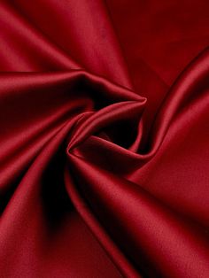 Indulge in the luxurious feel of this 58"/60" wide (147/152 cm) Silk Skin Duchess fabric, also known as Peau de Soie. Its dull satin finish and lightweight drape make it a perfect choice for creating elegant bridesmaid dresses, formal gowns, or any special occasion attire. With a subtle sheen and smooth texture, this high-quality silk fabric offers a sophisticated look and feel. Whether you're a professional dressmaker or an avid sewing enthusiast, this versatile material will elevate your projects with its timeless beauty and exceptional craftsmanship. Elevate your sewing experience and create stunning garments that will turn heads with this premium Silk Skin Duchess fabric. Luxurious Fabric: Crafted from exquisite peau de soie silk, this fabric offers a dull satin finish and a smooth, su Duchess Fabric, Bridesmaid Dresses Formal, Elegant Bridesmaid Dresses, Elegant Drapes, Matte Satin, Red Satin, Dresses Formal, Smooth Texture, Formal Gowns