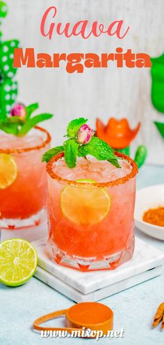 two glasses filled with watermelon margaritas and garnish