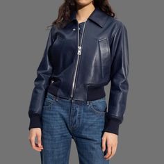 Introducing our navy blue leather jacket womens, the perfect blend of style and sophistication. Crafted with meticulous attention to detail, this jacket is designed to elevate your fashion game and make a lasting impression. Made from high-quality leather, it offers both durability and a luxurious feel. Navy jacket made of 100% nappa leather Features a convenient zip fastening for easy closure Two slip pockets offer practical storage options Ribbed trims at the hem and cuffs add a stylish touch Chic Blue Leather Jacket For Work, Blue Leather Jacket For Work, Blue Leather Jacket For Workwear In Winter, Navy Blue Short Jacket, Blue Leather Outerwear For Fall, Trendy Blue Leather Jacket With Zipper, Winter Blue Leather Jacket With Pockets, Chic Blue Leather Jacket With Zipper, Blue Leather Jacket Outfit