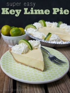 there is a slice of key lime pie on the plate and two bowls of limes in the background