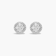 These dazzling earrings are filled with classic sparkle. Each shimmering earrings gets an A for fashion. Luxury Bridal Earrings With Pave Setting, Luxury Round Cut Sparkling Diamond Earrings, Classic Sparkling Diamond Cluster Earrings, Luxury Sparkling Round Cut Diamond Earrings, Classic Halo Design Cluster Earrings, Elegant White Gold Cluster Earrings With Pave Setting, Classic Cluster Halo Earrings, Formal Sparkling White Gold Cluster Earrings, Formal Sparkling Diamond White Cluster Earrings