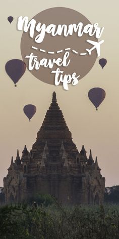 the myanmar travel tips banner with hot air balloons in the sky above an ancient temple