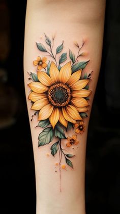 Sunflowers are often associated with joy and positivity. When we see a sunflower, we often feel uplifted by its bright colors and tall presence.  A sunflower tattoo can represent a person's desire to spread happiness and embrace life's joyful moments. It’s a constant reminder to focus on the brighter side of life, no matter our circumstances. Sunflower Colored Tattoo, Sunflower Tattoo Lower Back, Lioness And Sunflower Tattoo, Flower Tattoos Sunflower, Sweetest Of The Sunflowers Tattoo, Sunflower Lion Tattoo, Sunflowers Tattoo Ideas, Sun Flower Tattoos, Sunflower Color Tattoo